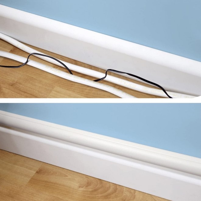 Hide your TV wires inside a baseboard raceway - they usually have adhesive backing and are made of plastic, so you can cut them down to size.