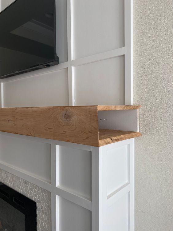 A mantel that is hollow inside can hold all the cables you want to hide, this is a very smart and cool idea.