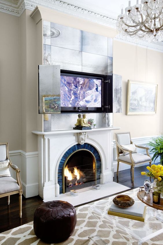 A fireplace and an artwork over it that hides a TV - open the doors and you will get your TV.