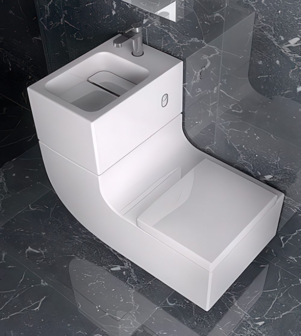 Stylish curved toilet and sink combo.
