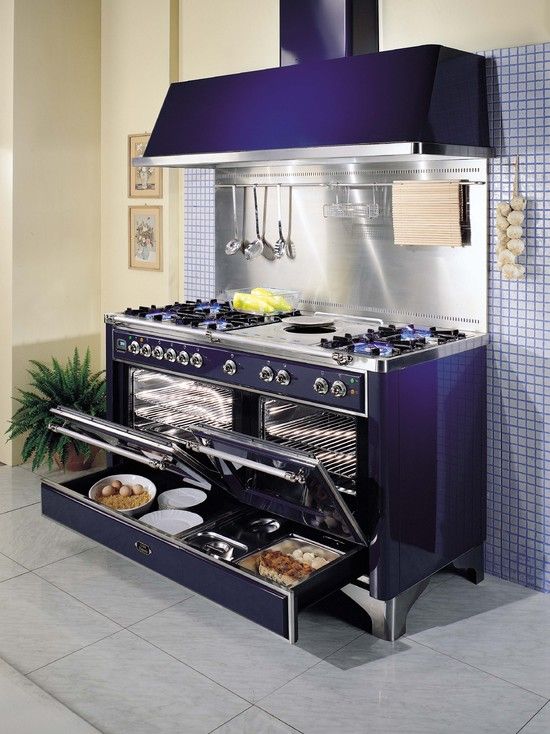 A deep purple double cooker with an additional drawer and a hood.