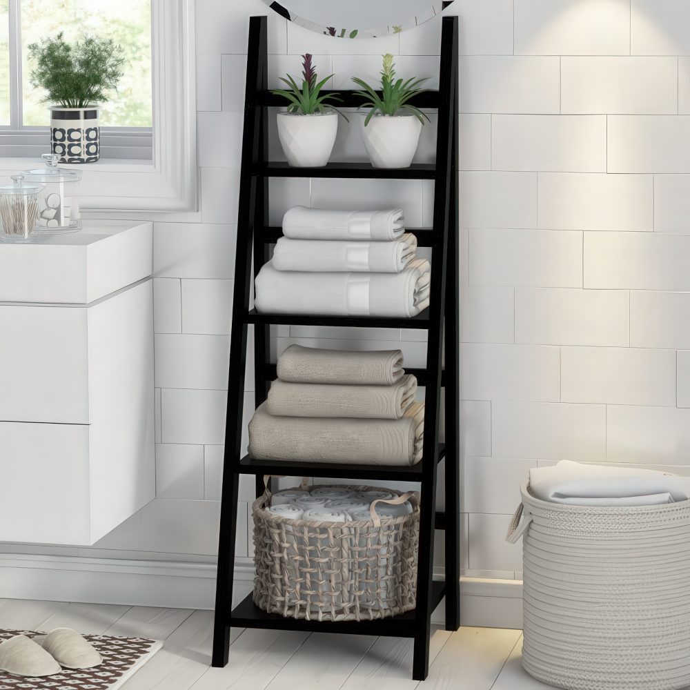 A black ladder is a space-saving storage unit for any bathroom, it works not only for towels but also for other pieces.