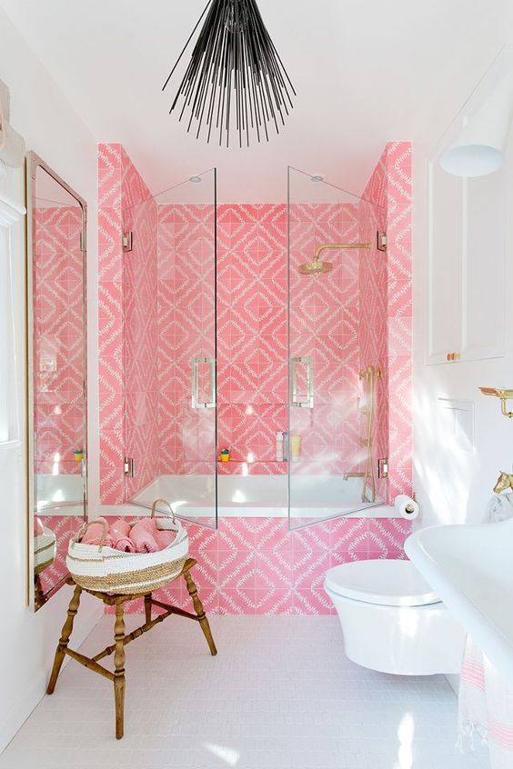 Bold pink printed tiles for accenting the shower zone and creating an ultimate glam look.