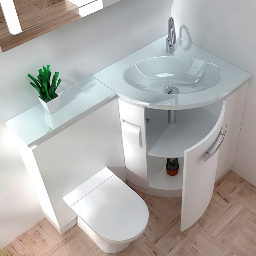 A sink with a storage space and counter and a toilet in one unit.
