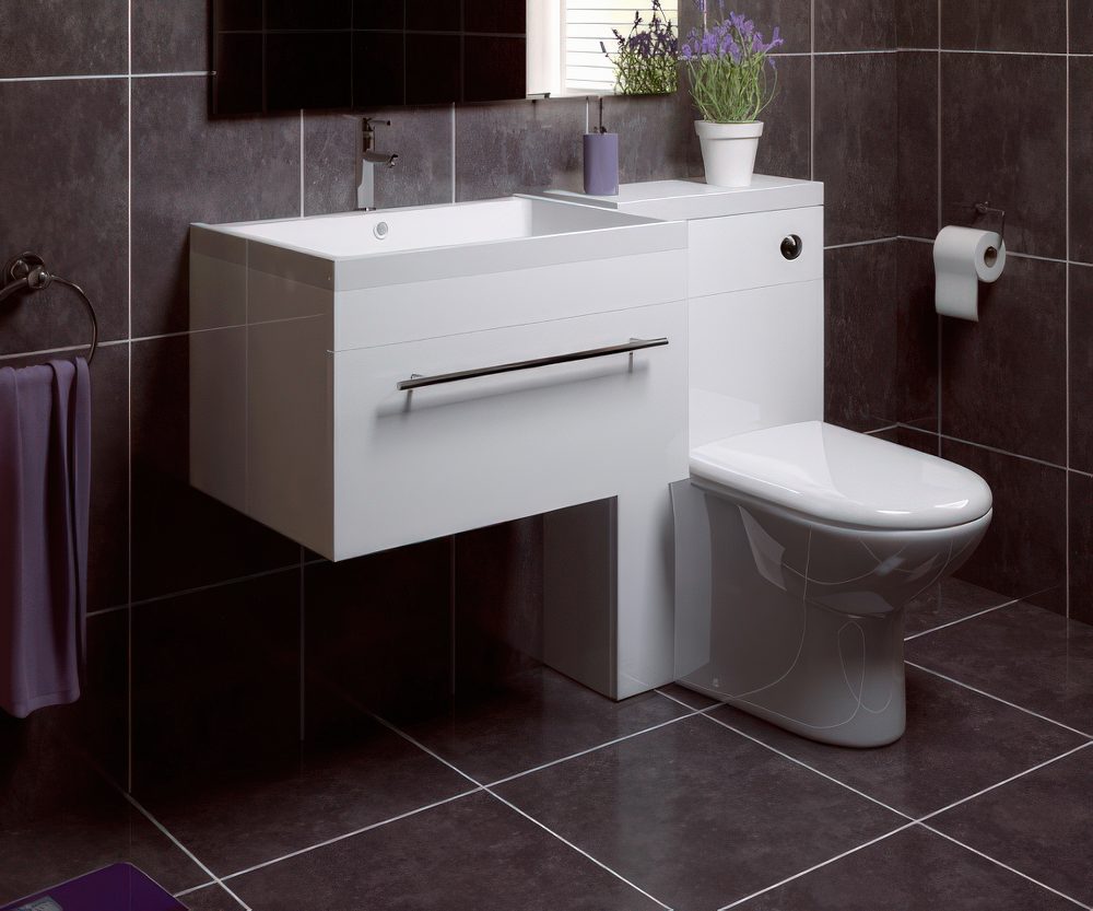 Modern sink, toilet and storage drawer combo.