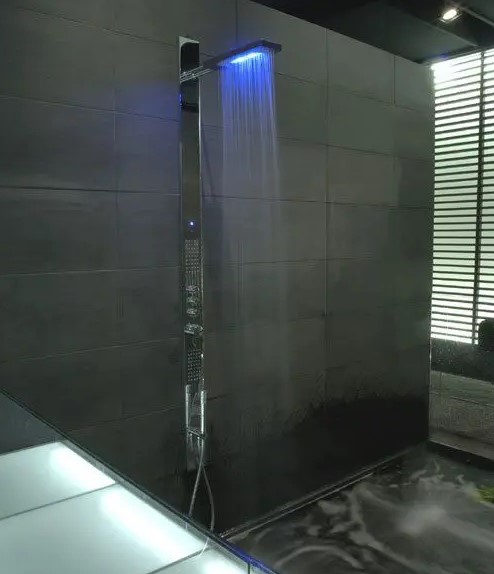 An ultra-modern shower panel with LED lights is a cool idea for a any modern bathroom and will make a person relax more.
