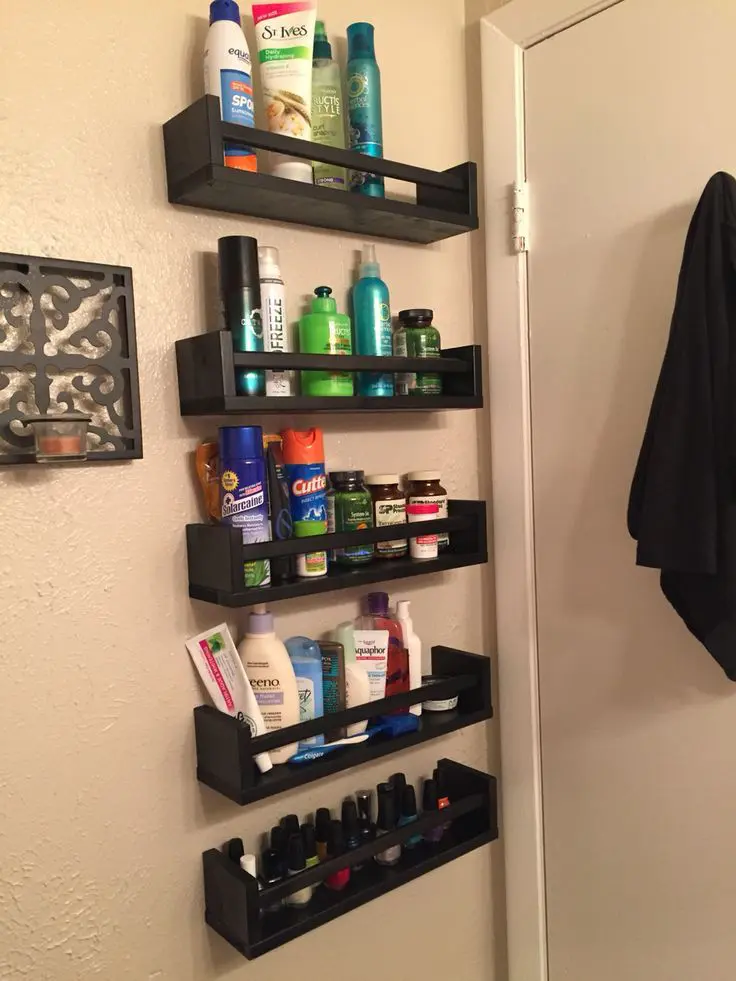 Attach some black ledges to the wall in the bathroom, so you will be able to store some stuff there.