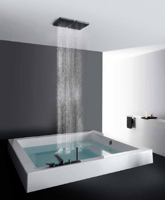 A contemporary to minimalist bathroom in grey, black and white, with a square bathtub and a rain shower is a lovely and cool idea.