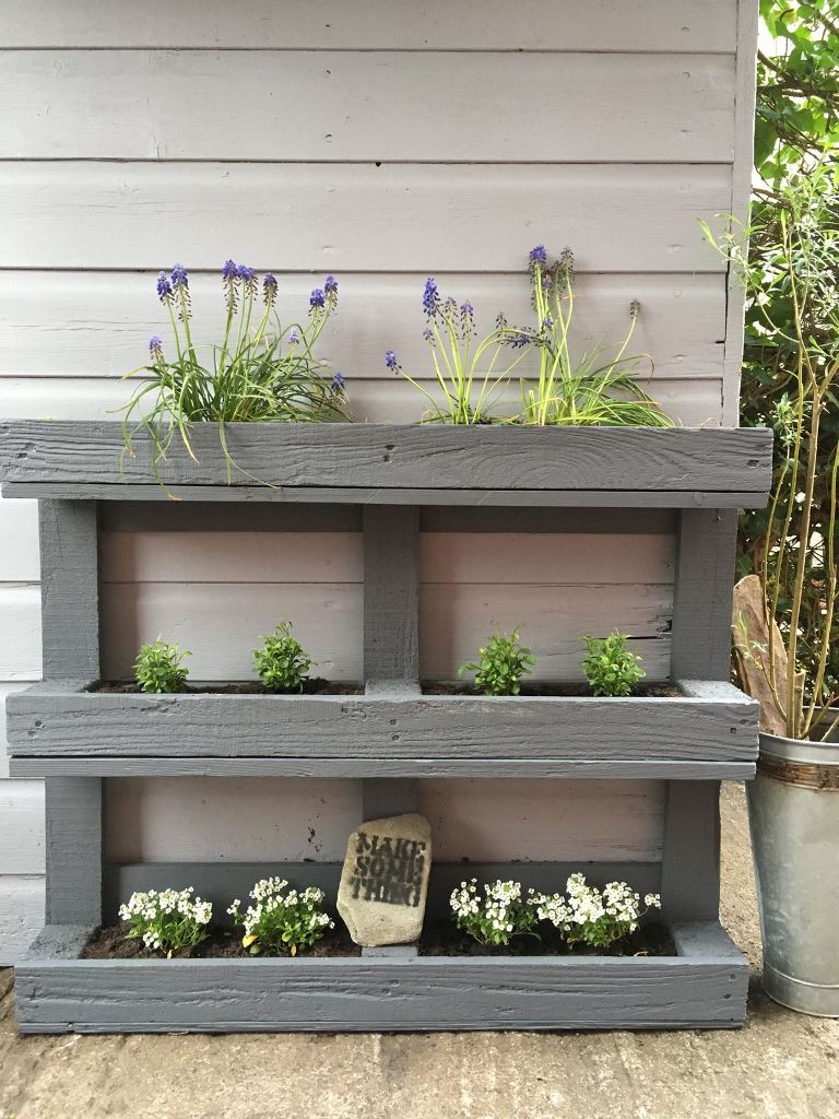 This grey pallet is a lovely way to decorate a space without wasting much of it.