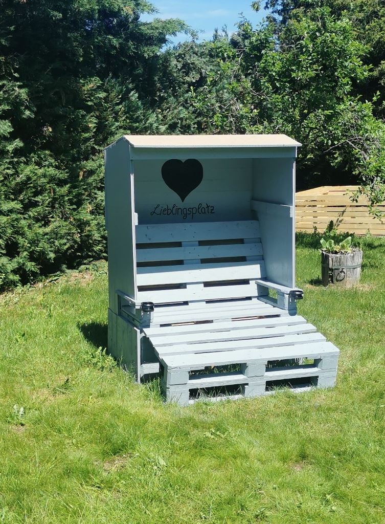 This simple and cool arbor is a nice spot to have a rest after or during working in the garden.