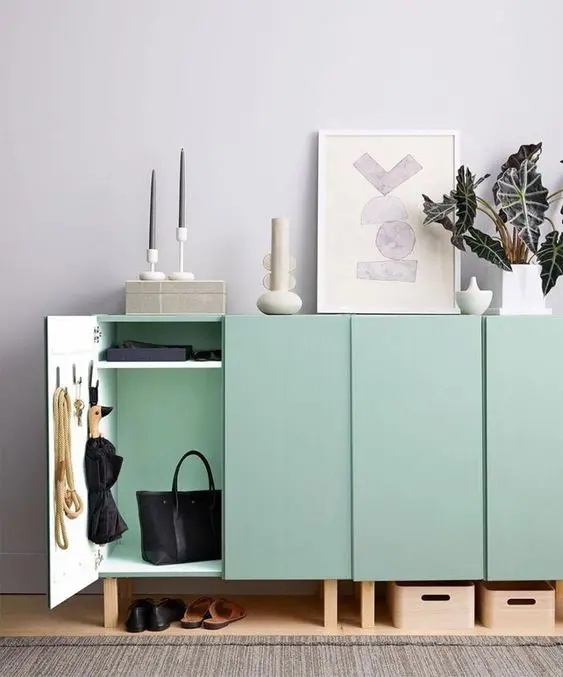 Lovely mint green IKEA Metod cabinets on stained legs will be a perfect fit for a Scandinavian space, with a slight touch of color.