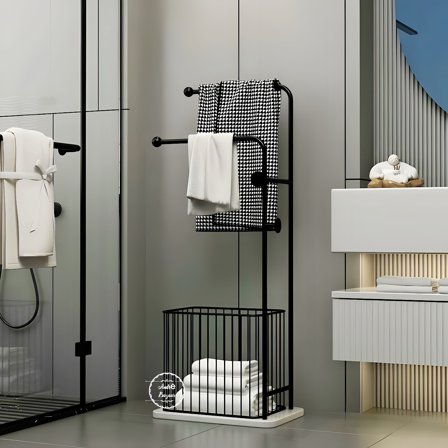 I love this one 'cause it just works. A built-in towel rack and basket below? Functional and looks good next to pretty much any modern bathroom.

(@andrebazaar.eg).