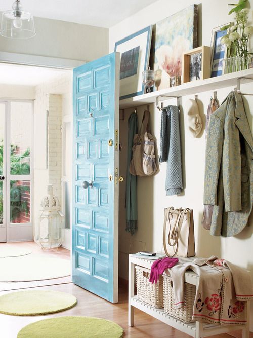 The rack with hooks is used for clothes and a gallery wall and it's so long that it goes behind the door, too.