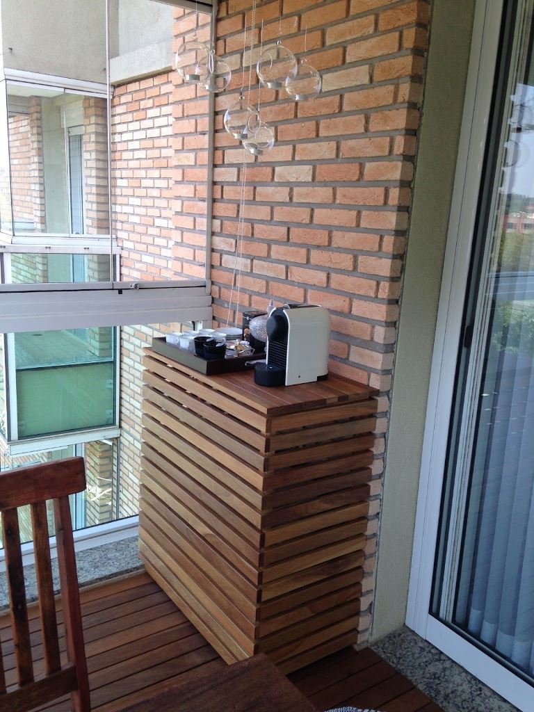 The small slatted console table in the corner is an AC unit cover and a home bar in one.