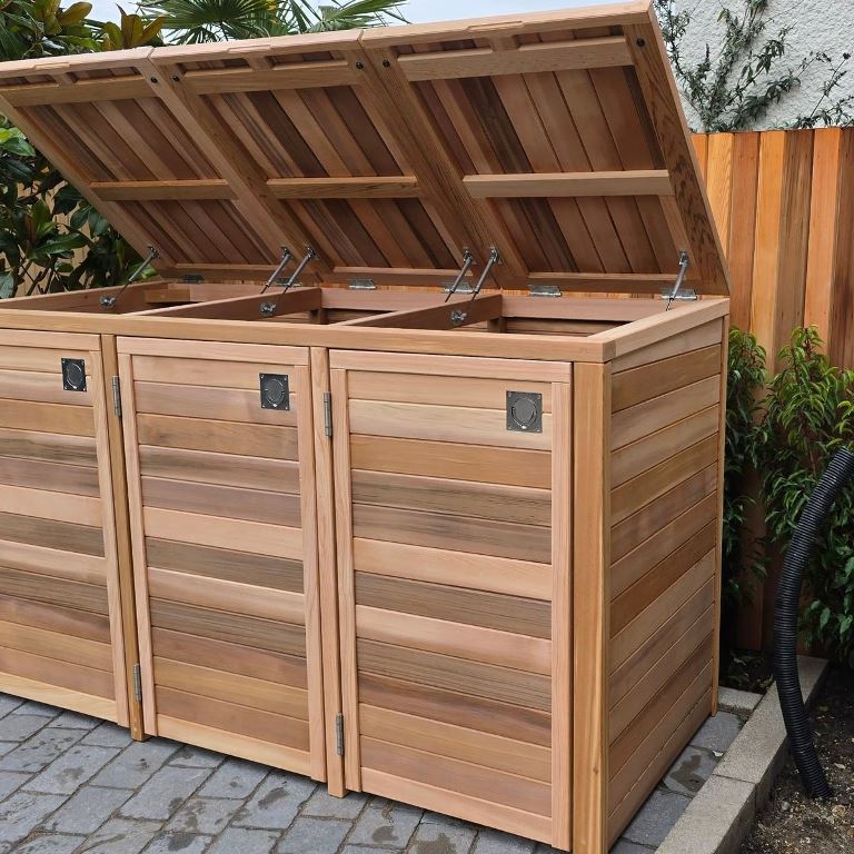 This large sleek stained box with a lid is a cool solution to hide trash cans.