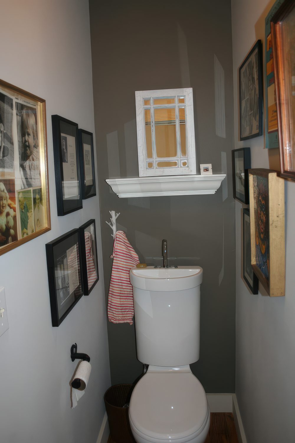 When you combine a toilet and a sink you might use wall space for photo frames or some other decor. (Samantha Schoech).