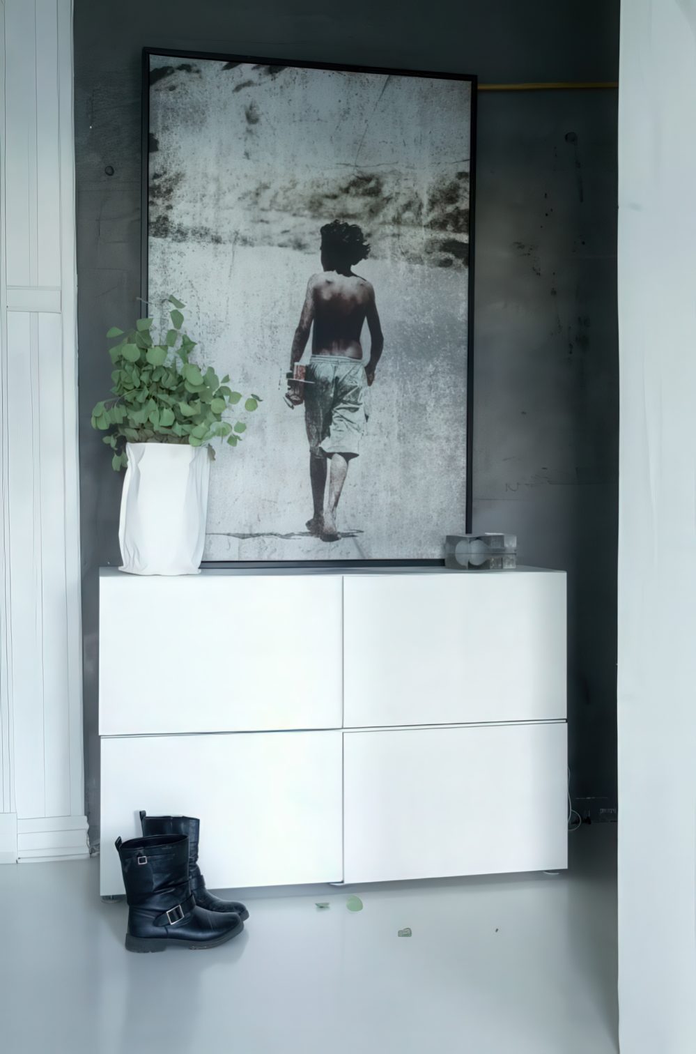 Simple IKEA Besta storage unit in a hallway.